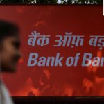 Why is Bank of Baroda paying $600 million to settle a case?
