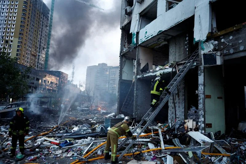 Russian attack on Kyiv kills three, hits apartments, other buildings