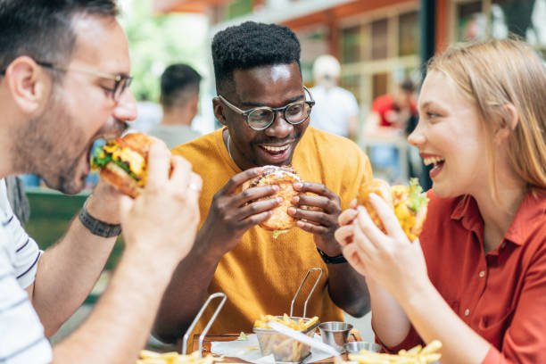 How do fast food restaurants maintain consistency in taste?