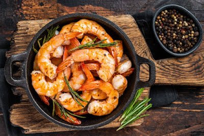 What Are the Potential Risks of Eating Raw Seafood?